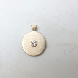 gold medallion pendant